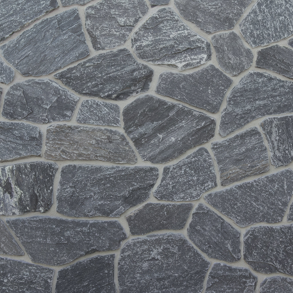 Pembroke natural stone paver tile sample showing irregular dark gray stone pieces with light gray mortar